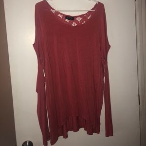 Cold Shoulder top with lace back embellishment.